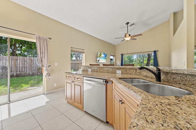 6815 NW 28th St, Margate, FL 33063 - kitchen featuring white dishwasher, a sink, a ceiling fan, light tile patterned floors, and light stone countertops