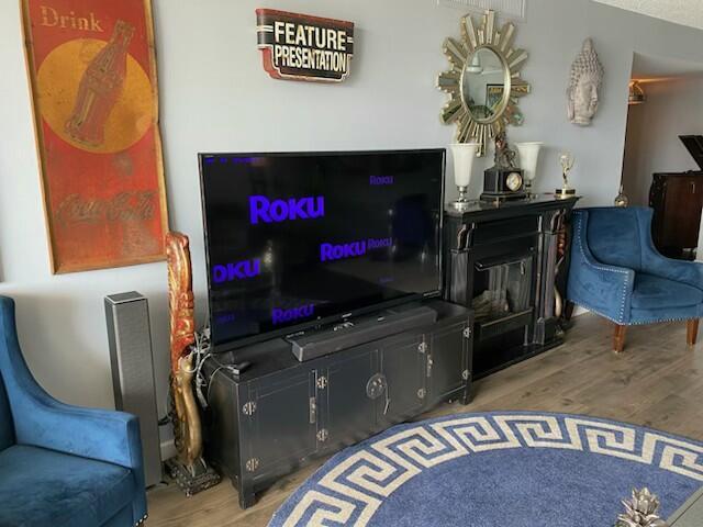3545 S Ocean Blvd Unit 704, South Palm Beach, FL 33480 - living area featuring wood finished floors