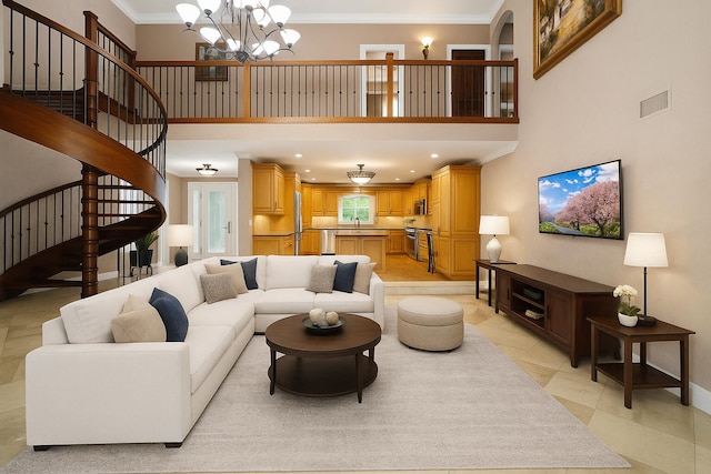 434 NW 7th Ave, Boca Raton, FL 33486 - living area featuring a chandelier, crown molding, a towering ceiling, stairway, and recessed lighting