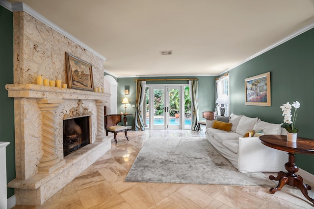434 NW 7th Ave, Boca Raton, FL 33486 - living area with ornamental molding, a stone fireplace, and french doors