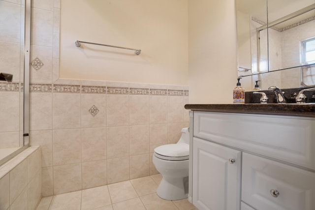 434 NW 7th Ave, Boca Raton, FL 33486 - full bathroom with toilet, vanity, tiled shower, tile walls, and tile patterned floors