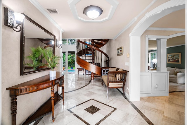 434 NW 7th Ave, Boca Raton, FL 33486 - entrance foyer featuring stairway, inlaid floor details, ornate columns, arched walkways, and ornamental molding