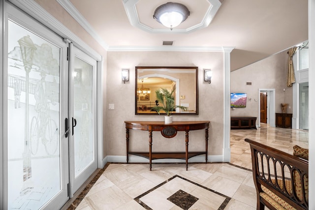434 NW 7th Ave, Boca Raton, FL 33486 - foyer featuring baseboards, inlaid floor details, crown molding, and healthy amount of natural light