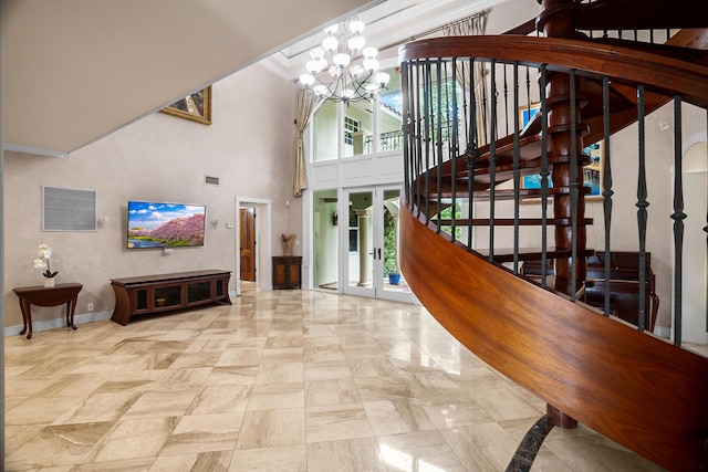 434 NW 7th Ave, Boca Raton, FL 33486 - entryway featuring a chandelier, stairs, plenty of natural light, baseboards, and a towering ceiling