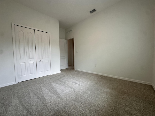 1517 SW Bayshore Blvd, Port Saint Lucie, FL 34983 - unfurnished bedroom with carpet, a closet, and baseboards