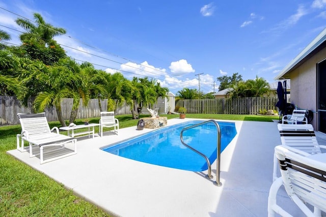 5333 SE Celestial Cir, Stuart, FL 34997 - view of pool with a patio, a fenced backyard, and a shed
