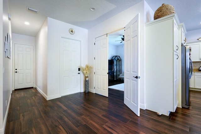 5333 SE Celestial Cir, Stuart, FL 34997 - entryway featuring dark wood-style flooring and recessed lighting