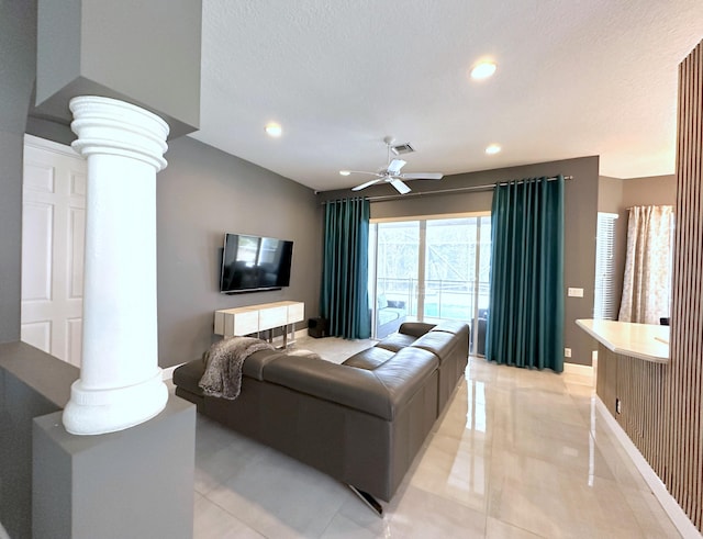 8825 Gibson Cay, West Palm Beach, FL 33411 - living room featuring ornate columns, ceiling fan, baseboards, and recessed lighting