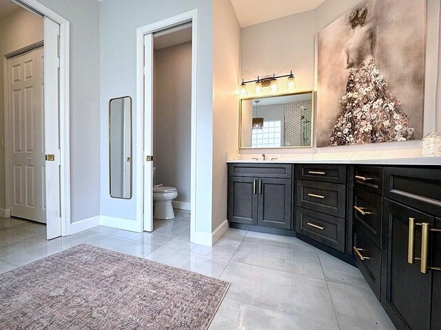 8825 Gibson Cay, West Palm Beach, FL 33411 - bathroom featuring double vanity, tile patterned flooring, and a shower