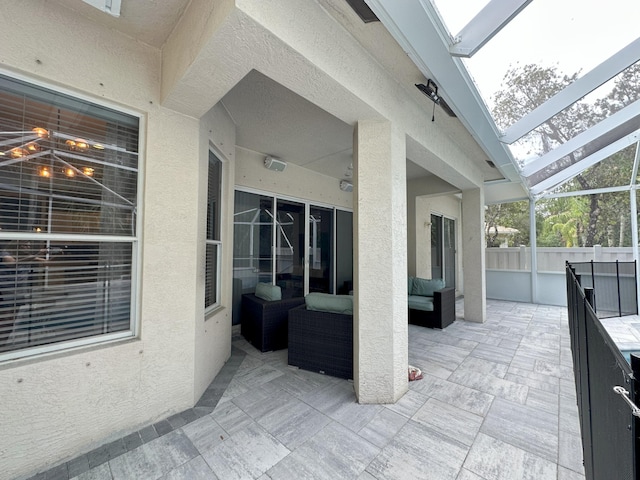 8825 Gibson Cay, West Palm Beach, FL 33411 - view of patio / terrace featuring an outdoor hangout area and a lanai