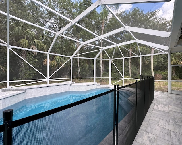 8825 Gibson Cay, West Palm Beach, FL 33411 - outdoor pool featuring a lanai and a patio area