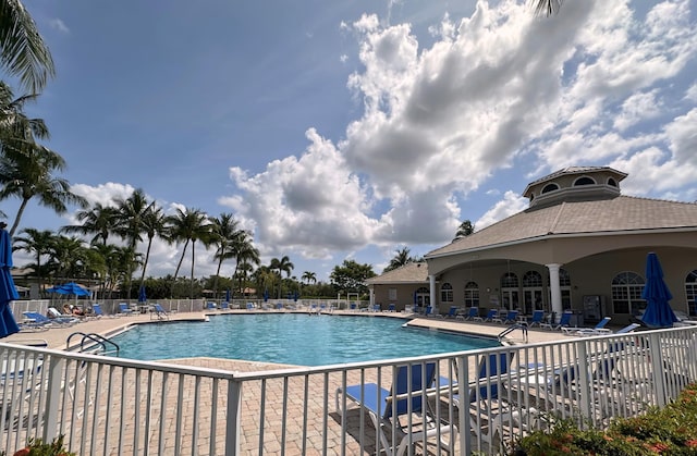 8825 Gibson Cay, West Palm Beach, FL 33411 - community pool featuring a patio