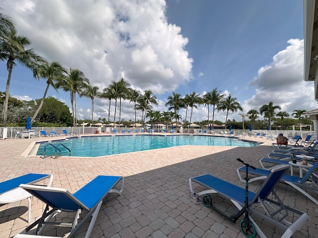 8825 Gibson Cay, West Palm Beach, FL 33411 - community pool featuring a patio