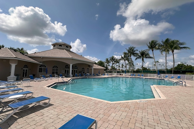 8825 Gibson Cay, West Palm Beach, FL 33411 - community pool with a patio area
