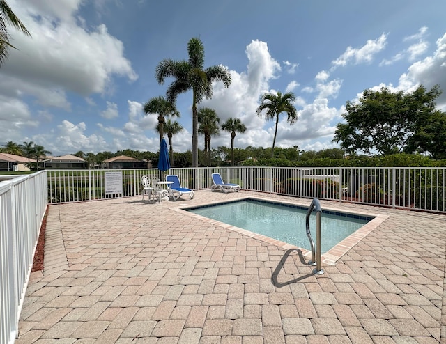 8825 Gibson Cay, West Palm Beach, FL 33411 - community pool featuring a patio