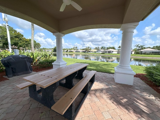8825 Gibson Cay, West Palm Beach, FL 33411 - view of patio / terrace with a ceiling fan, a water view, and area for grilling