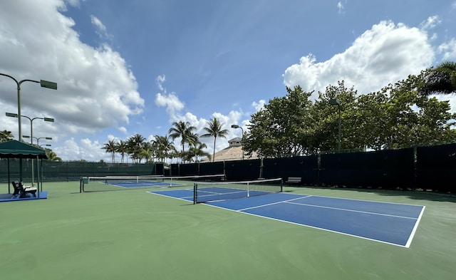 8825 Gibson Cay, West Palm Beach, FL 33411 - view of tennis court with community basketball court