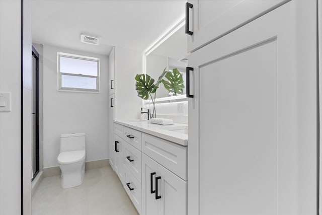 700 NE Harbour Ter Unit 3320, Boca Raton, FL 33431 - bathroom with double vanity, a shower stall, toilet, and tile patterned flooring
