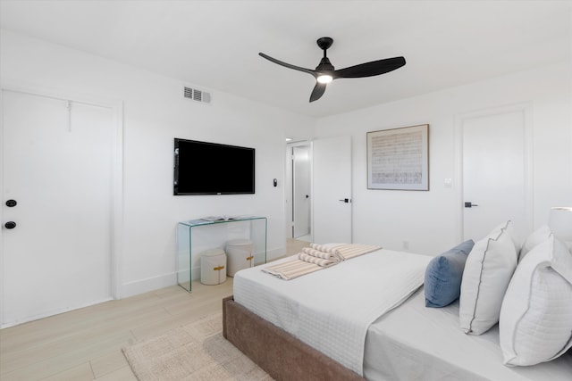 700 NE Harbour Ter Unit 3320, Boca Raton, FL 33431 - bedroom featuring wood finished floors, ceiling fan, and baseboards