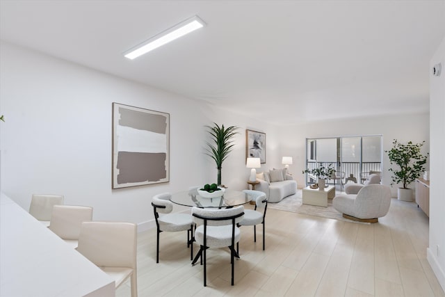 700 NE Harbour Ter Unit 3320, Boca Raton, FL 33431 - dining area featuring light wood-type flooring