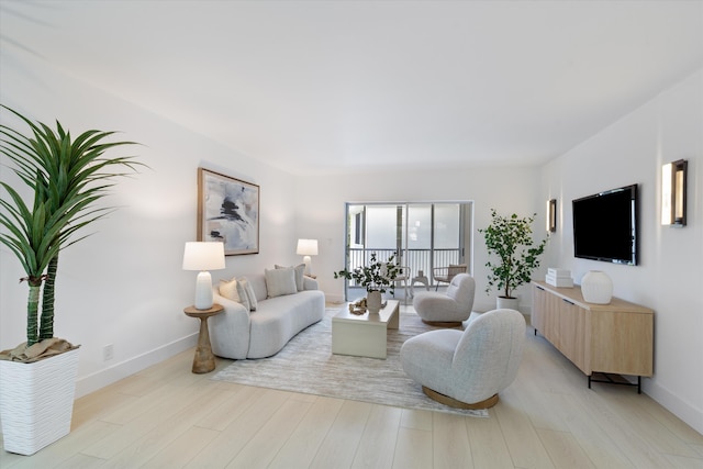 700 NE Harbour Ter Unit 3320, Boca Raton, FL 33431 - living room with light wood finished floors and baseboards