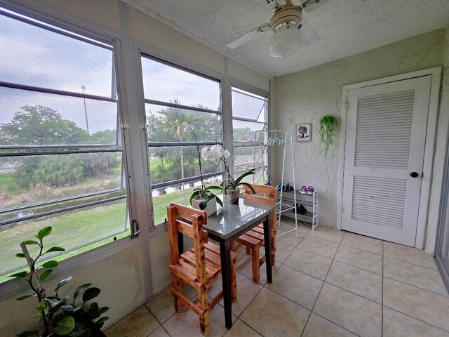 725 Lori Dr Unit 206, Palm Springs, FL 33406 - sunroom featuring a ceiling fan