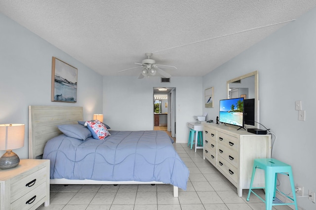 1 Harbourside Dr Unit 4506, Delray Beach, FL 33483 - bedroom with light tile patterned floors, a textured ceiling, and a ceiling fan