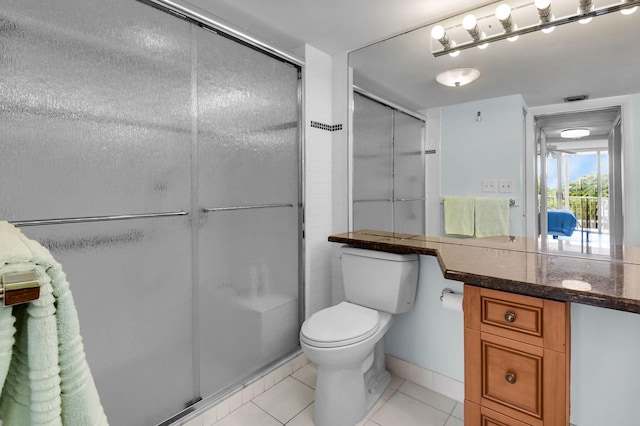 1 Harbourside Dr Unit 4506, Delray Beach, FL 33483 - bathroom with tile patterned floors, a shower stall, toilet, and vanity