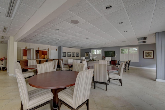 1 Harbourside Dr Unit 4506, Delray Beach, FL 33483 - dining area featuring baseboards, light tile patterned floors, and a paneled ceiling