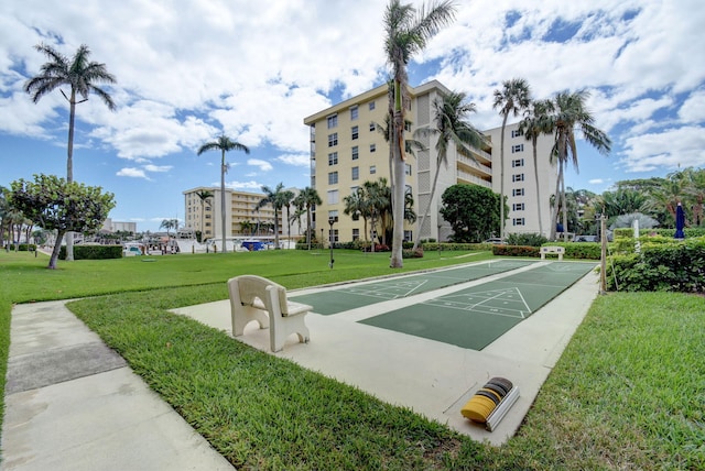 1 Harbourside Dr Unit 4506, Delray Beach, FL 33483 - surrounding community with shuffleboard and a yard