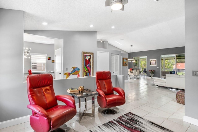 7685 Springwater Pl Unit 201, Boynton Beach, FL 33437 - sitting room featuring vaulted ceiling, baseboards, tile patterned floors, recessed lighting, and a textured ceiling