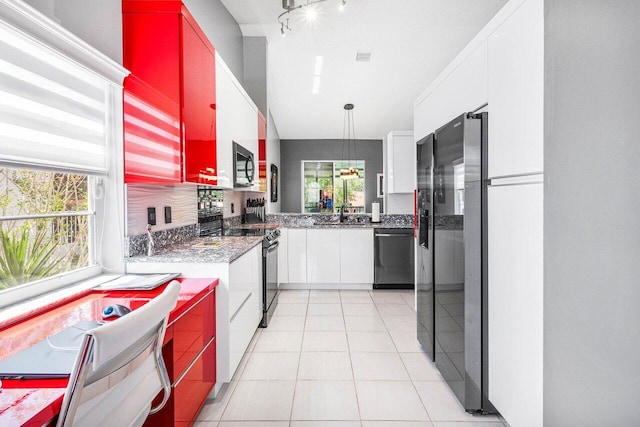 7685 Springwater Pl Unit 201, Boynton Beach, FL 33437 - kitchen featuring fridge with ice dispenser, stainless steel dishwasher, black microwave, range with electric cooktop, and light tile patterned flooring