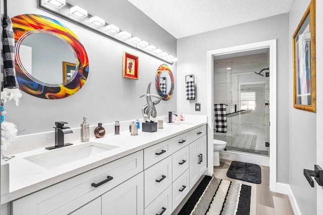 7685 Springwater Pl Unit 201, Boynton Beach, FL 33437 - full bath with toilet, a shower stall, double vanity, and a textured ceiling