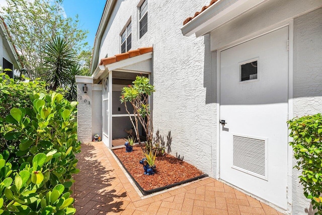 7685 Springwater Pl Unit 201, Boynton Beach, FL 33437 - property entrance featuring stucco siding