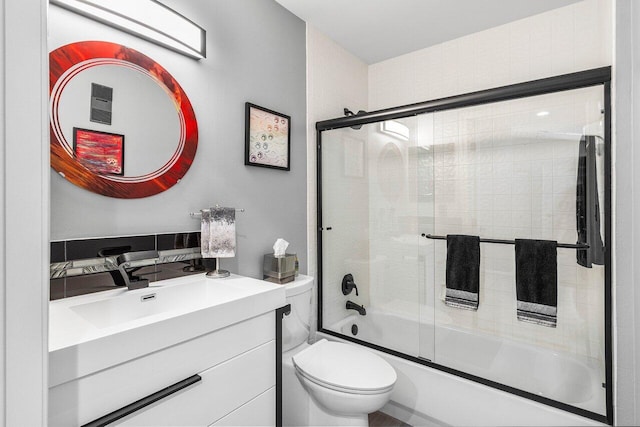 7685 Springwater Pl Unit 201, Boynton Beach, FL 33437 - full bathroom featuring bath / shower combo with glass door, toilet, and vanity