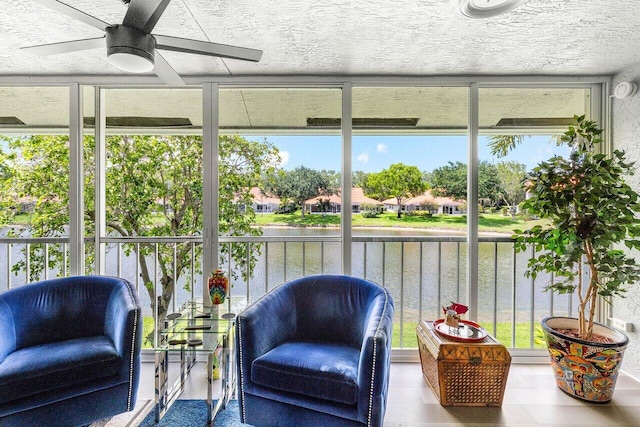 7685 Springwater Pl Unit 201, Boynton Beach, FL 33437 - sunroom with ceiling fan and a water view