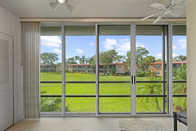 1953 SW Palm City Rd Unit 27-I, Stuart, FL 34994 - unfurnished sunroom featuring ceiling fan