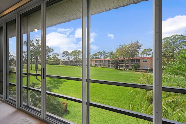 1953 SW Palm City Rd Unit 27-I, Stuart, FL 34994 - unfurnished sunroom with golf course view