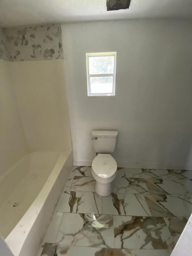 4235 Clay St, Marianna, FL 32446 - full bath featuring toilet and marble finish floors