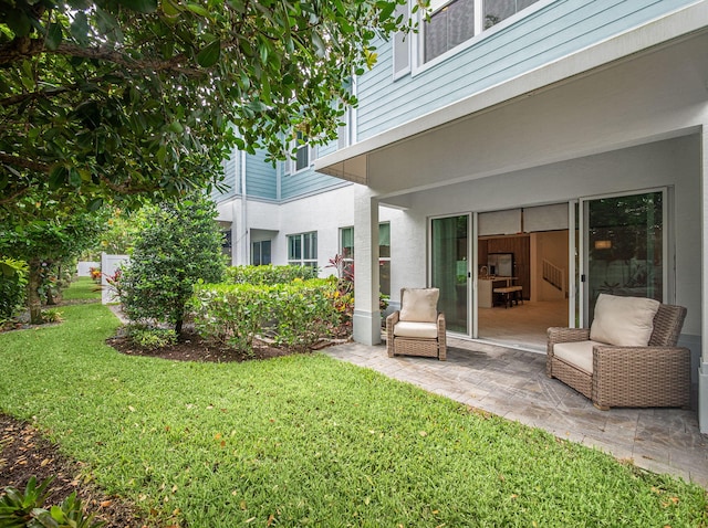 4829 Pointe Midtown Rd Unit 4829, Palm Beach Gardens, FL 33418 - view of grassy yard with a patio area