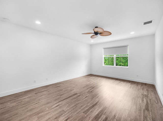 4829 Pointe Midtown Rd Unit 4829, Palm Beach Gardens, FL 33418 - empty room featuring wood finished floors, a ceiling fan, recessed lighting, and baseboards