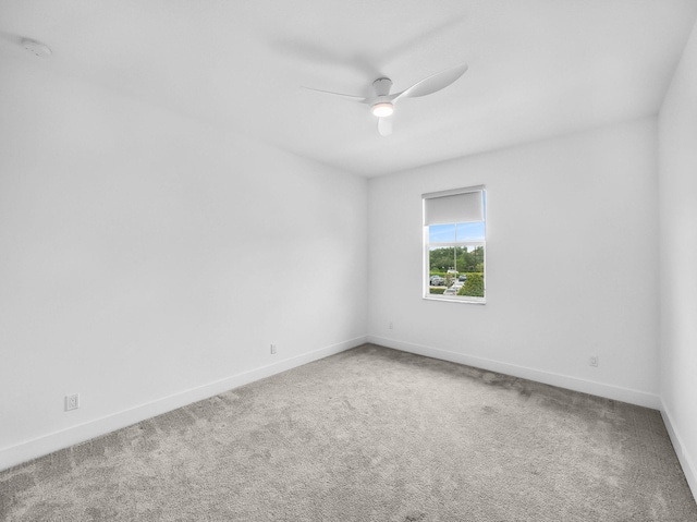 4829 Pointe Midtown Rd Unit 4829, Palm Beach Gardens, FL 33418 - spare room featuring ceiling fan, carpet flooring, baseboards, and a smoke detector