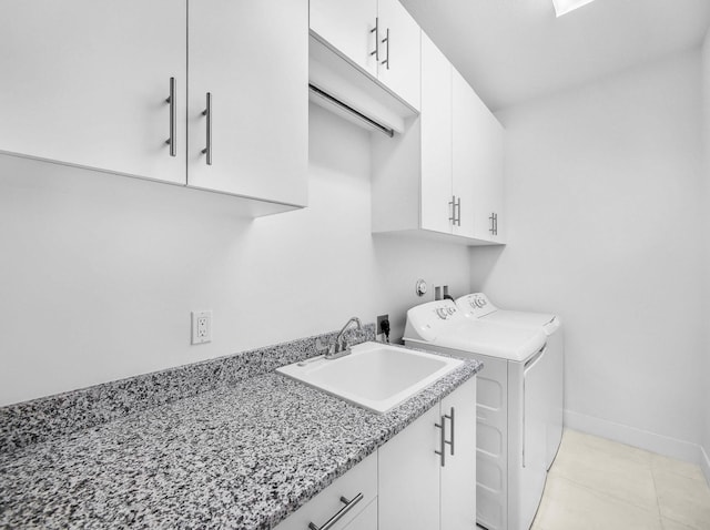 4829 Pointe Midtown Rd Unit 4829, Palm Beach Gardens, FL 33418 - washroom featuring separate washer and dryer, cabinet space, and baseboards