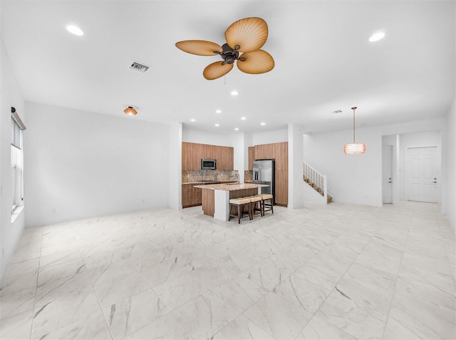 4829 Pointe Midtown Rd Unit 4829, Palm Beach Gardens, FL 33418 - living area with recessed lighting, ceiling fan, stairs, and a fireplace