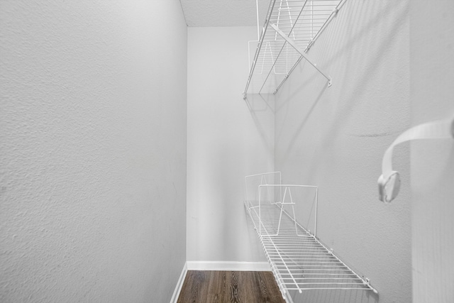 3710 N Jog Rd Unit 202, West Palm Beach, FL 33411 - spacious closet featuring dark wood-style floors