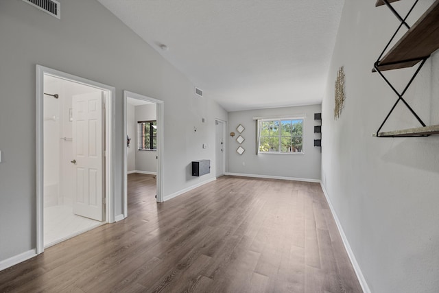 3710 N Jog Rd Unit 202, West Palm Beach, FL 33411 - unfurnished living room featuring wood finished floors and baseboards