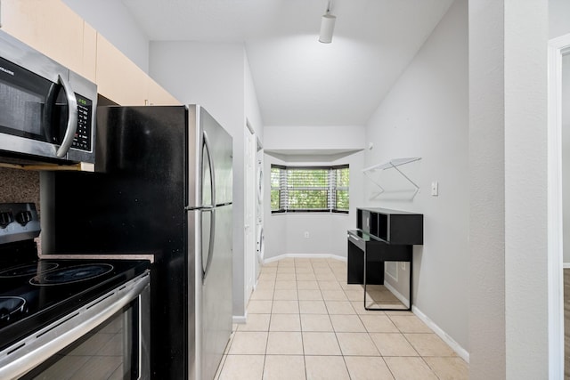 3710 N Jog Rd Unit 202, West Palm Beach, FL 33411 - kitchen featuring stainless steel appliances, light tile patterned flooring, and baseboards