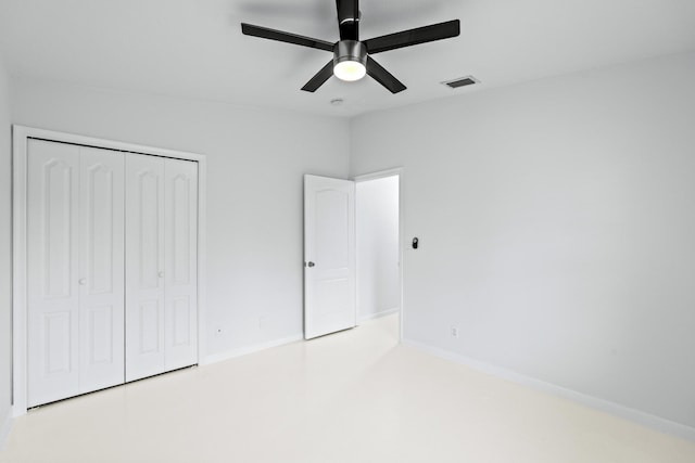 11356 Ira Ln, Lake Worth, FL 33449 - unfurnished bedroom with a closet, baseboards, and ceiling fan