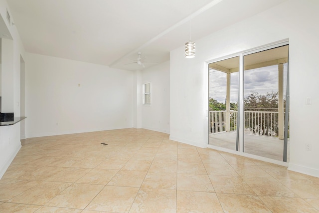 3960 N Flagler Dr Unit 305, West Palm Beach, FL 33407 - unfurnished living room featuring a ceiling fan and light tile patterned floors