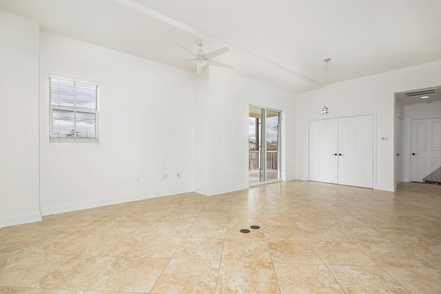 3960 N Flagler Dr Unit 305, West Palm Beach, FL 33407 - unfurnished room with ceiling fan and baseboards